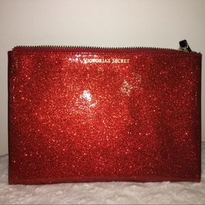Red sparkling Victoria’s Secret zip bag